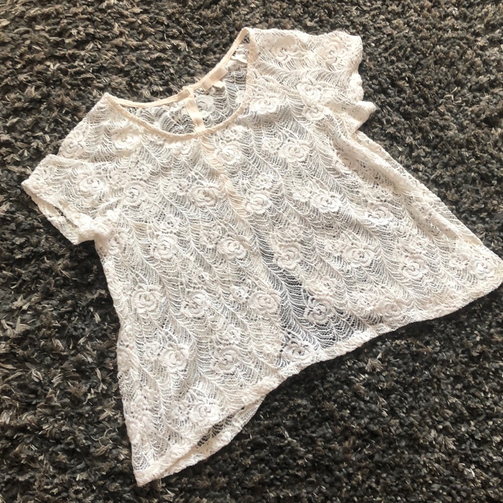 Beautiful cream lace top. Gently used.